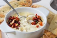 Golden Herb Flatbreads with Melted Cheese and Zesty Red Pepper Relish