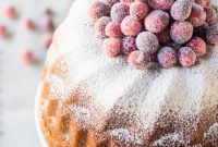 Velvet Orange Spice Cream Cheese Pound Cake Topped with Frosted Cranberries