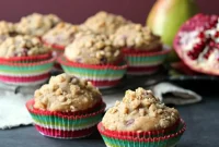 Spiced Pomegranate Pear Muffins with Ginger Oat Crumble