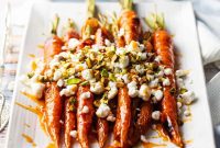 Sweet Heat Carrots with Creamy Chevre and Pistachio Crunch