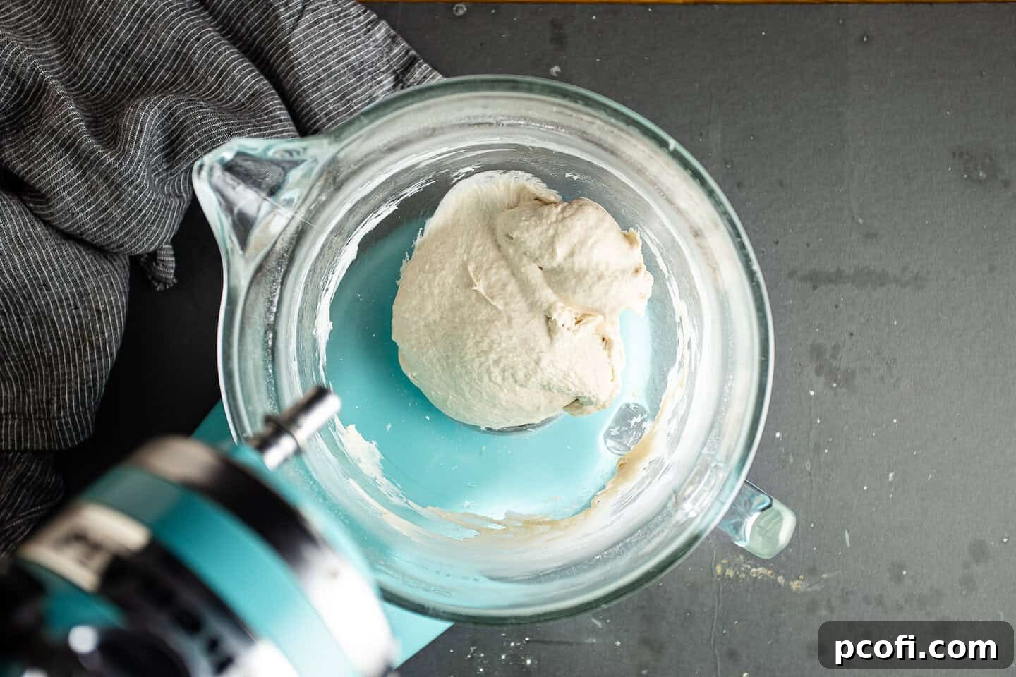 Smooth and elastic pita bread dough after thorough kneading, showing its improved texture.