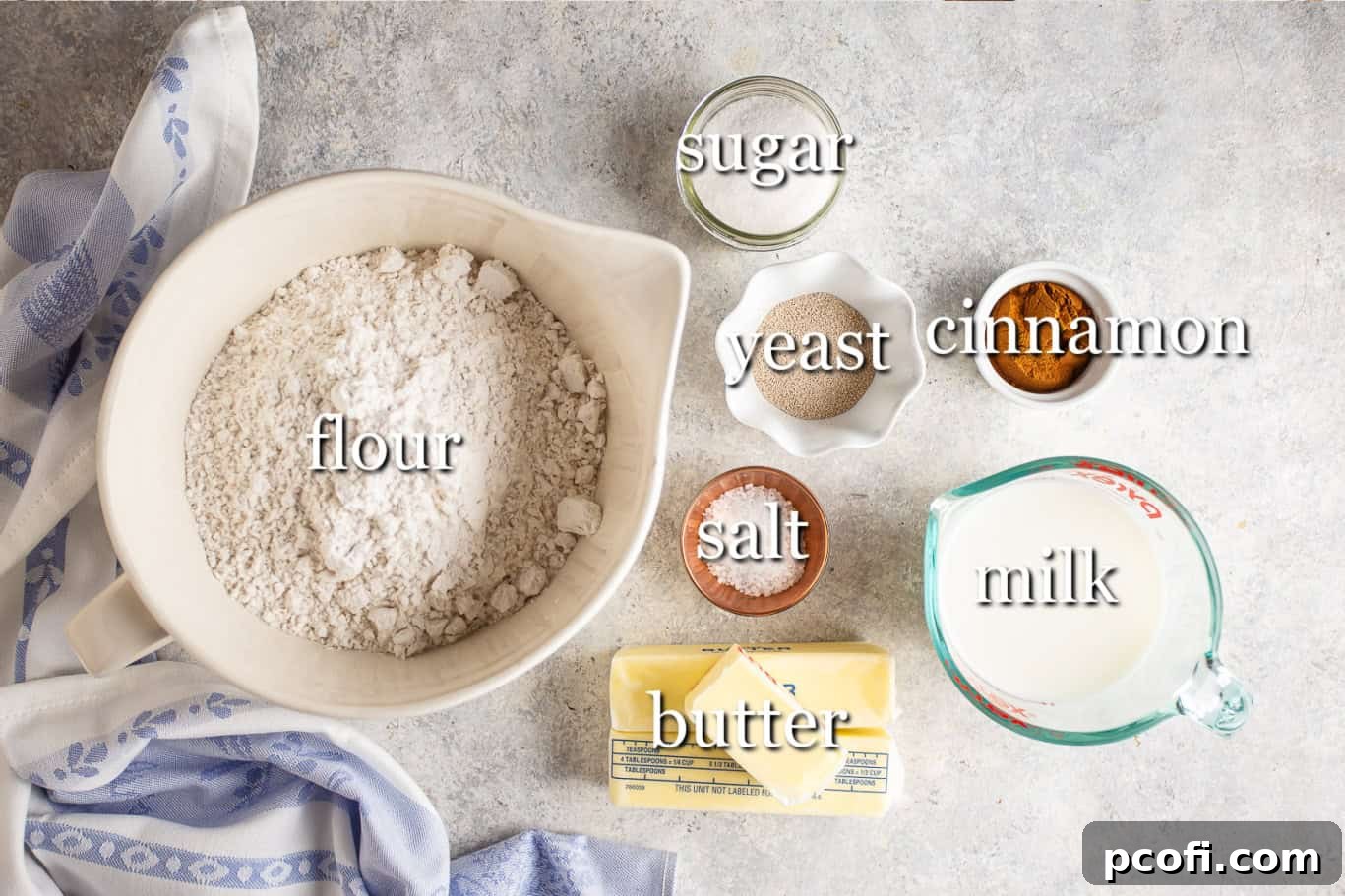 All ingredients for making cruffins, neatly arranged with clear text labels for easy identification.
