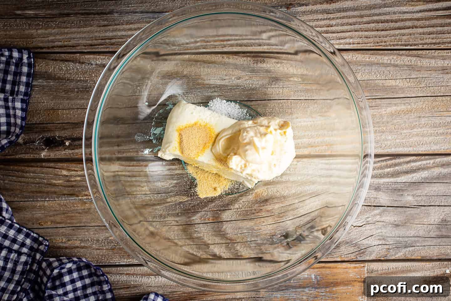 Cream cheese, mayonnaise, and seasonings in a large mixing bowl.