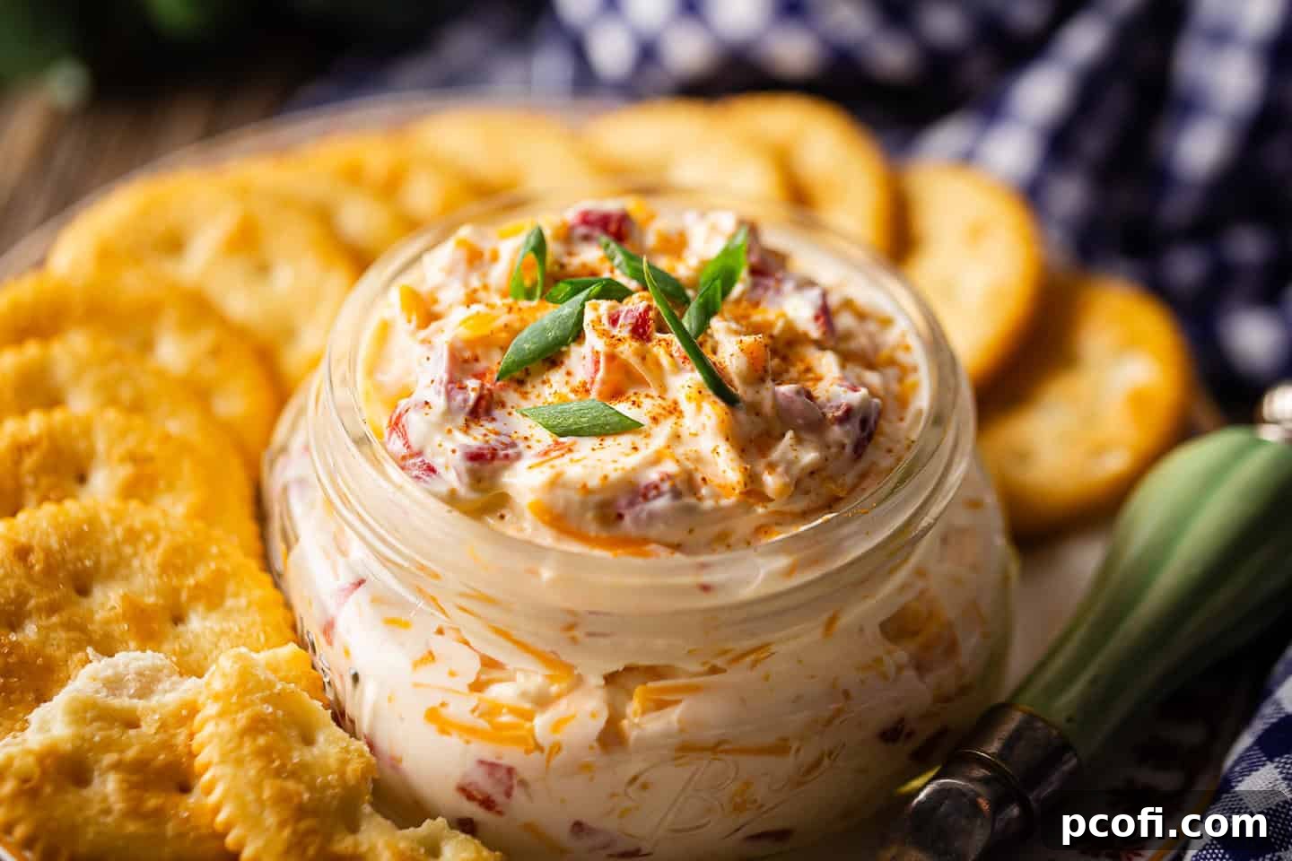 How to make pimento cheese in 2 easy steps, served with crackers or as a topping on sandwiches or a hot dip.