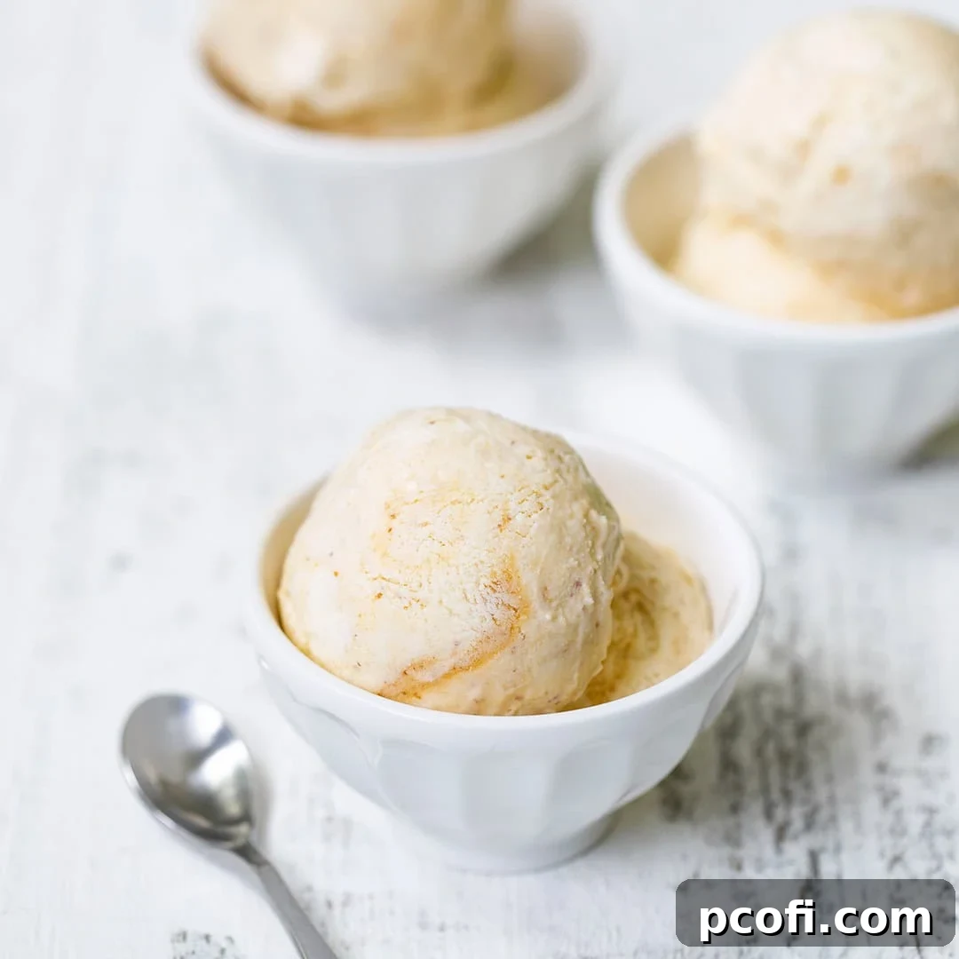 Homemade Peach Ice Cream in three bowls, ready to be served