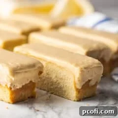 Homemade butterscotch krimpets on a white marble surface.