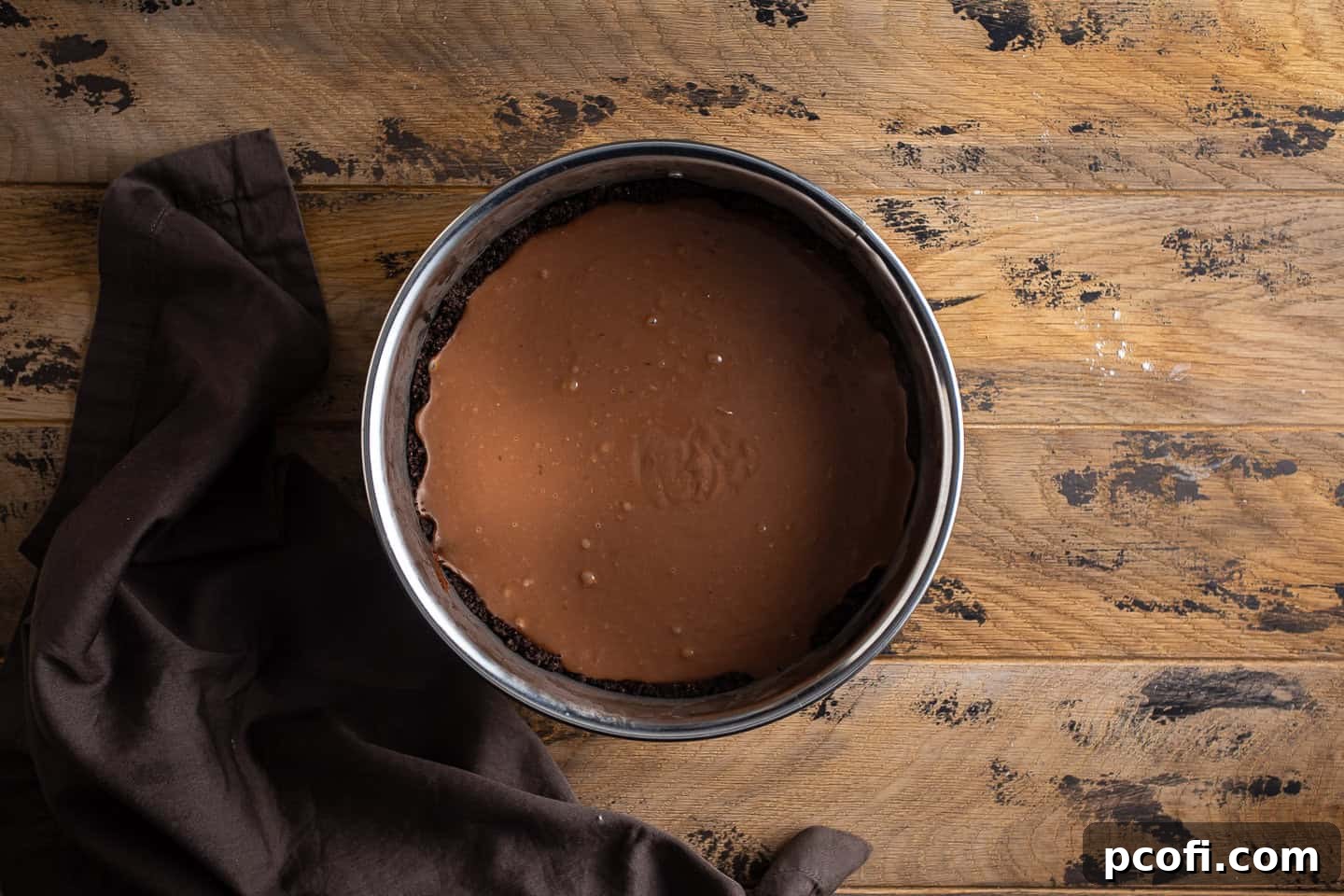 Chocolate pudding layered over brownie and Oreo crust.
