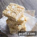 Classic and gooey Simply Perfect Rice Krispie Treats, a beloved no-bake dessert, ideal for quick assembly.