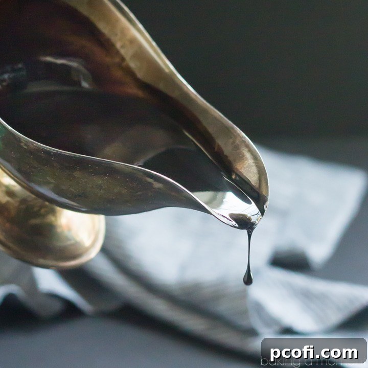 This Homemade Chocolate Syrup is so dark chocolatey! Just 4 simple ingredients and it only took 5 minutes to make. Never buying the bottled stuff again!