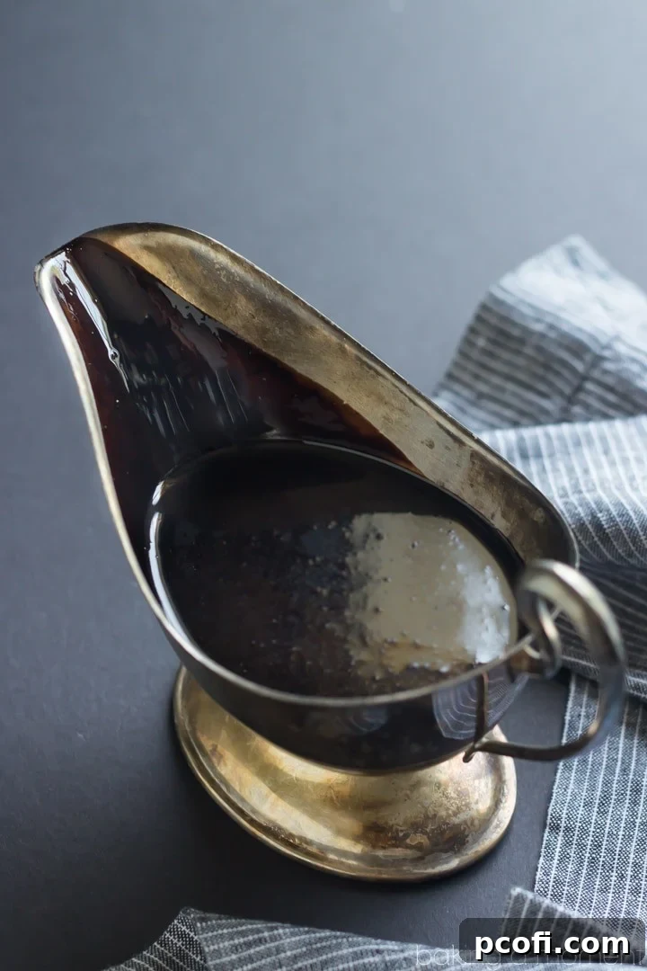 This Homemade Chocolate Syrup is so dark chocolatey! Just 4 simple ingredients and it only took 5 minutes to make. Never buying the bottled stuff again! 