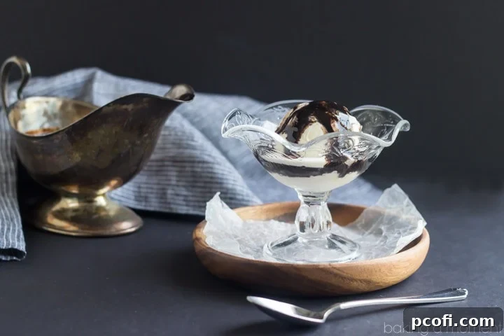 This Homemade Chocolate Syrup is so dark chocolatey! Just 4 simple ingredients and it only took 5 minutes to make. Never buying the bottled stuff again! 