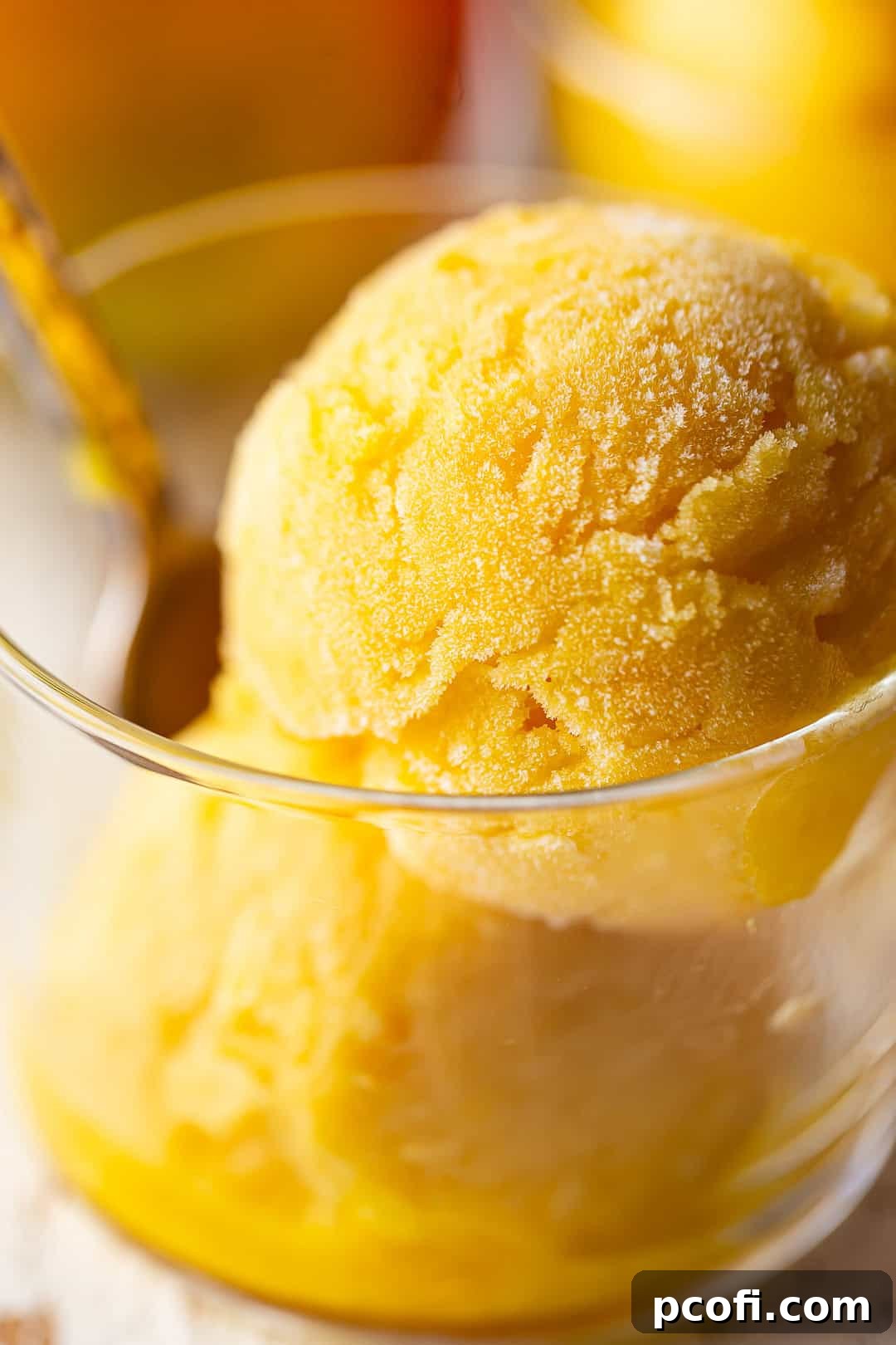 Close-up image of homemade mango sorbet, showcasing its smooth, vibrant texture and inviting appearance.