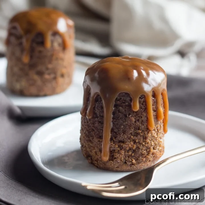 This Dark and Stormy Sticky Toffee Pudding dessert captures the essence of the classic cocktail, with spicy ginger and a delightful boozy kick from dark rum. The cake is incredibly moist and decadent, complemented perfectly by a rich butter rum sauce.