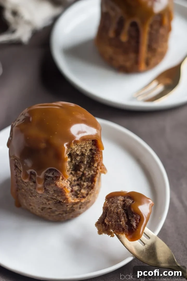 Indulge in the best Dark and Stormy Sticky Toffee Pudding recipe. This dessert combines the spicy kick of ginger, the rich flavor of dark rum, and the classic melt-in-your-mouth moistness of a British sticky toffee cake, all topped with an incredible butter rum sauce.