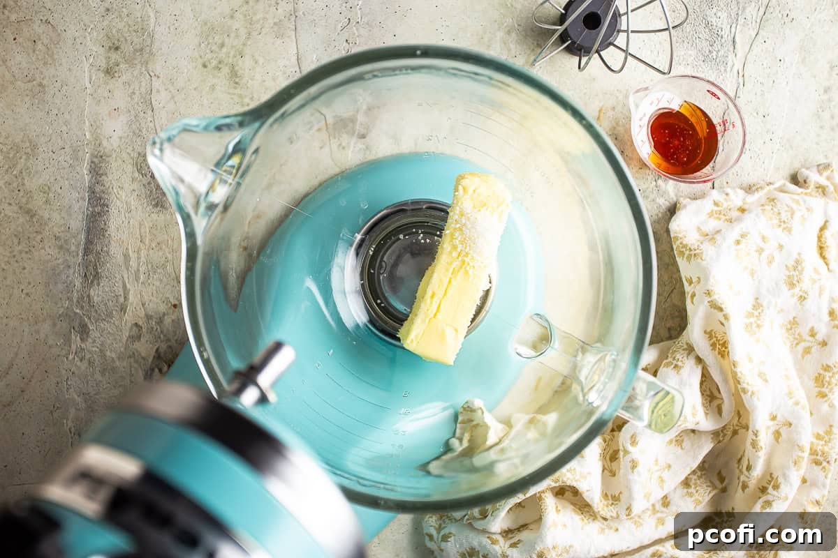 Softened butter and salt in the bowl of a stand mixer, ready for whipping.