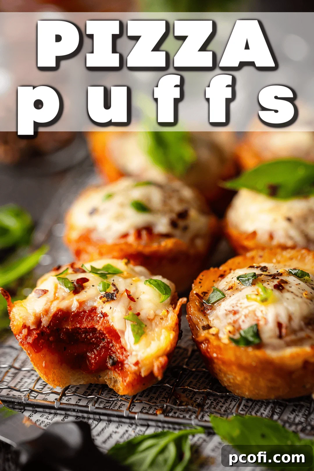Homemade Little Caesars pizza puffs with fresh basil leaves.