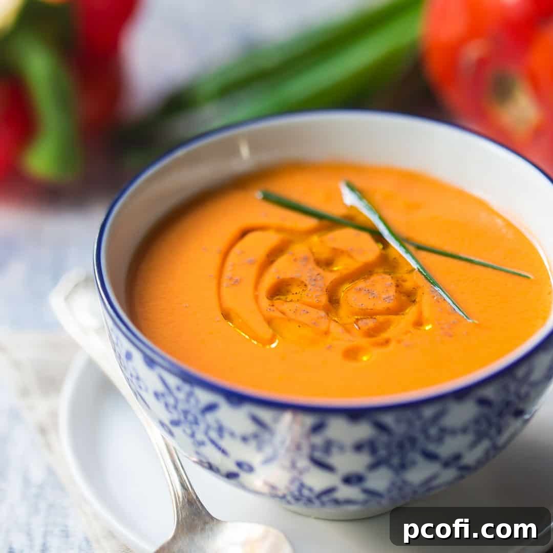 Authentic Spanish gazpacho in a blue porcelain bowl.