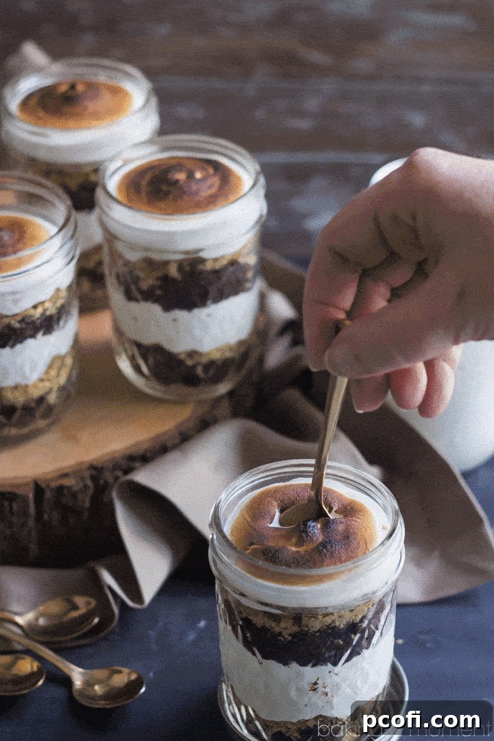 Perfect for a barbecue or potluck! These S'mores Cupcake Jars transport easily and they are TO DIE FOR! Soft and sweet, with just the right amount of crunch. They'll be the hit of the party! 