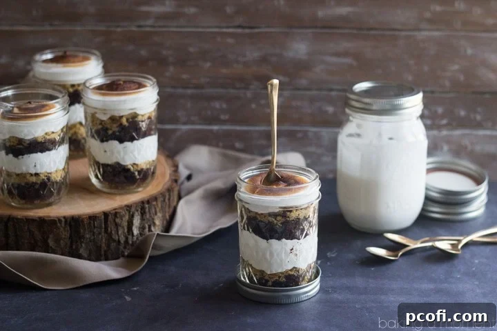 Perfect for a barbecue or potluck! These S'mores Cupcake Jars transport easily and they are TO DIE FOR! Soft and sweet, with just the right amount of crunch. They'll be the hit of the party! 