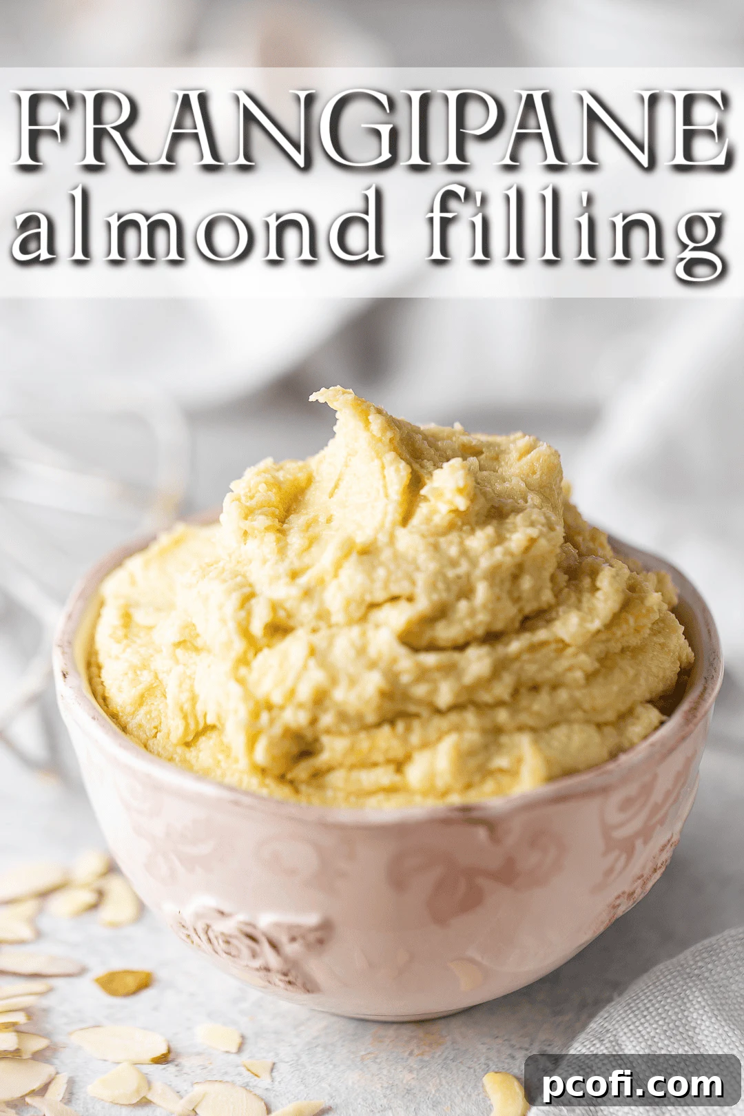 Frangipane recipe prepared and presented in a pink ceramic bowl with decorative elements.