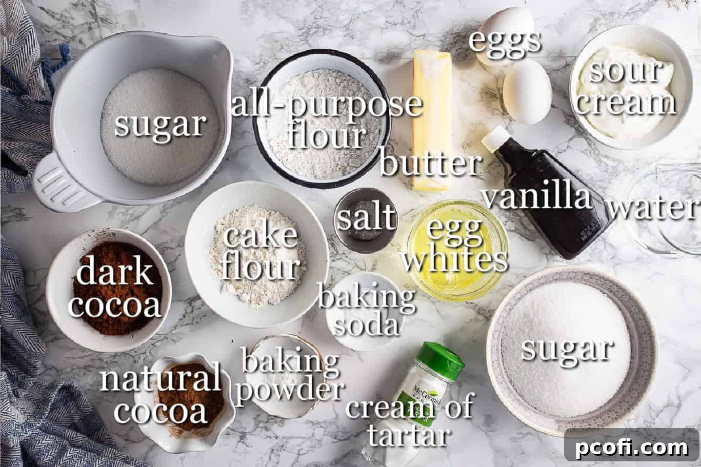 Ingredients for making devil's food cake and marshmallow frosting, with text labels.