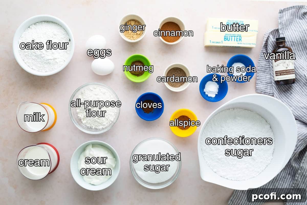 Ingredients for chai spice cupcakes and frosting in separate containers, neatly arranged.