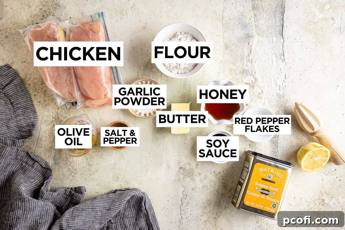 Key ingredients for honey butter chicken laid out with an overlay text displaying 'Ingredients'.