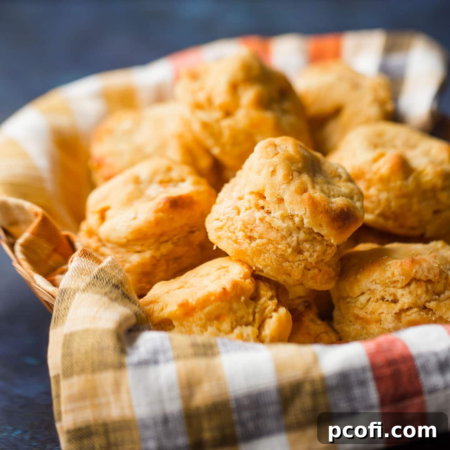 The best sweet potato biscuits recipe, showcasing their golden-brown tops and soft interiors.