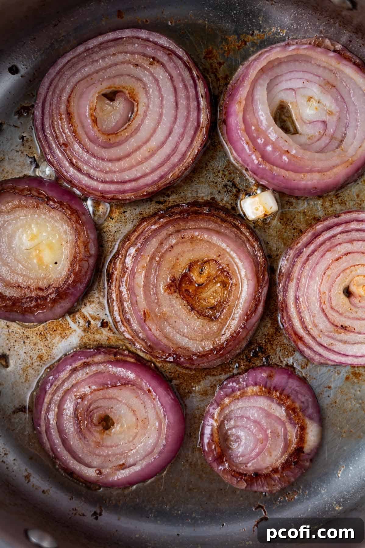 caramelized onion slices in a skillet
