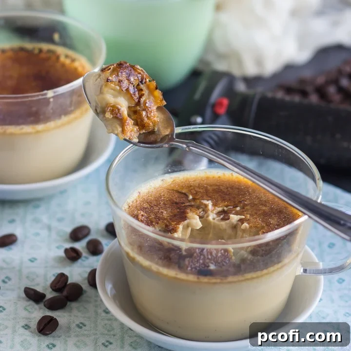 Two servings of Irish Coffee Creme Brulee, featuring a perfectly crackled burnt sugar topping, creamy coffee-infused custard, and a hint of boozy flavor, presented in elegant ramekins.
