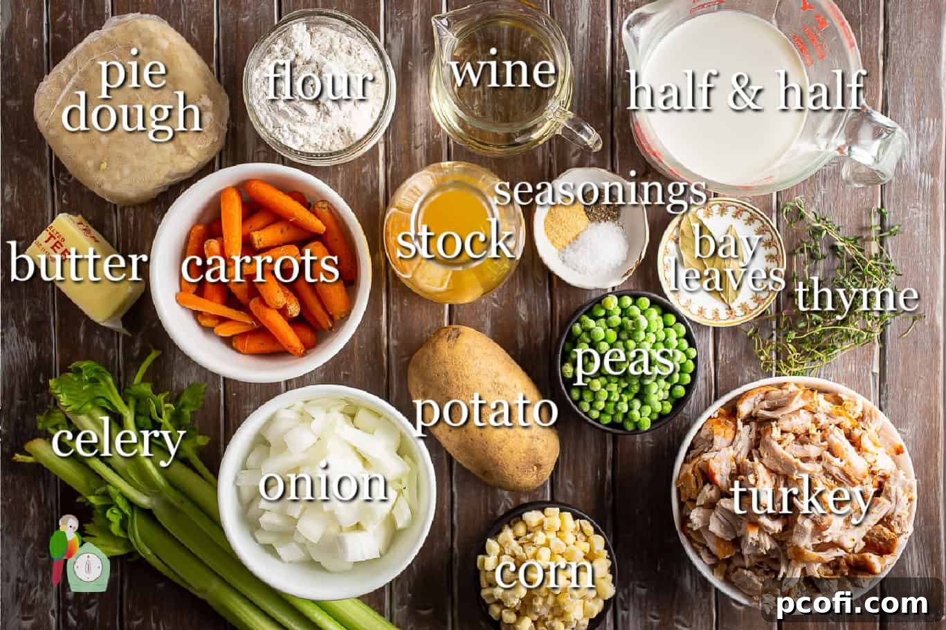 A collection of fresh ingredients laid out for preparing turkey pot pie, including butter, vegetables, and spices.