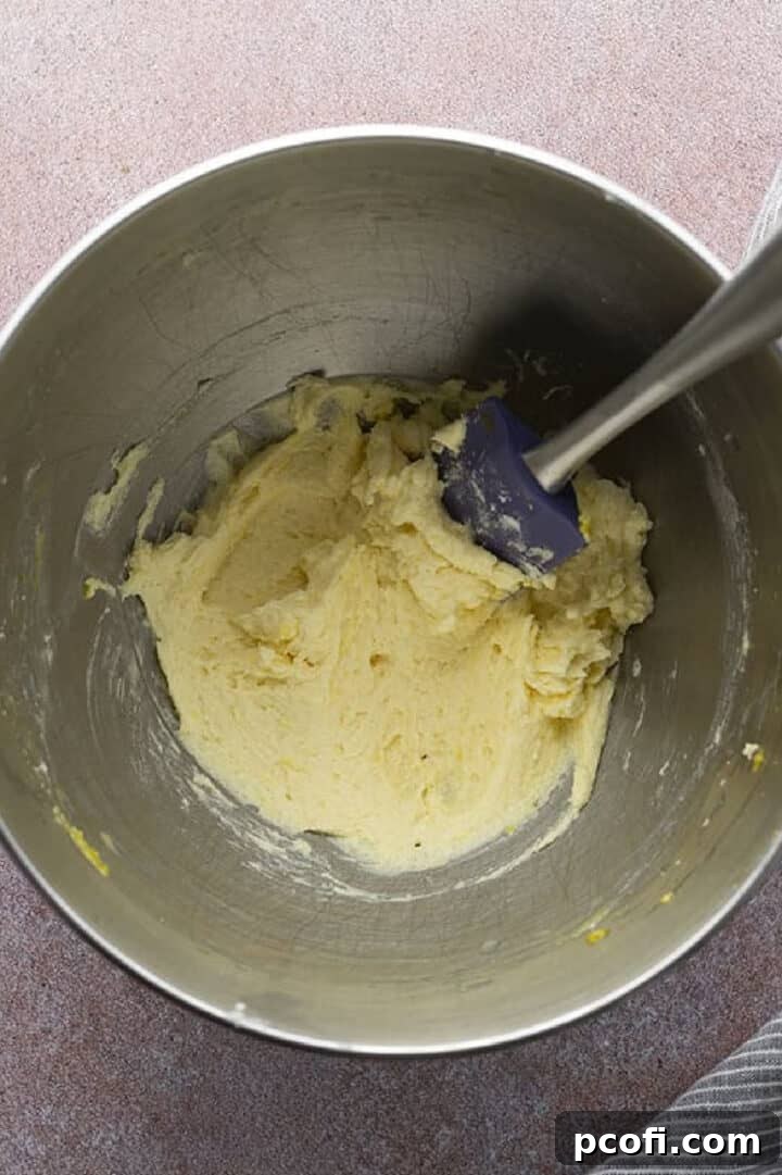 Creaming butter and sugar together.