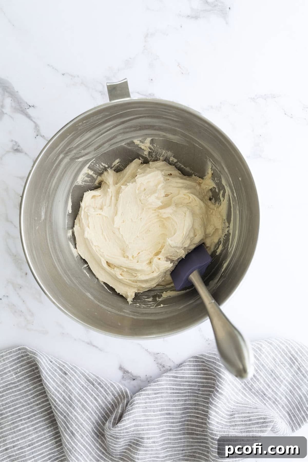 Smooth and creamy Irish cream buttercream in a mixing bowl, ready for frosting.