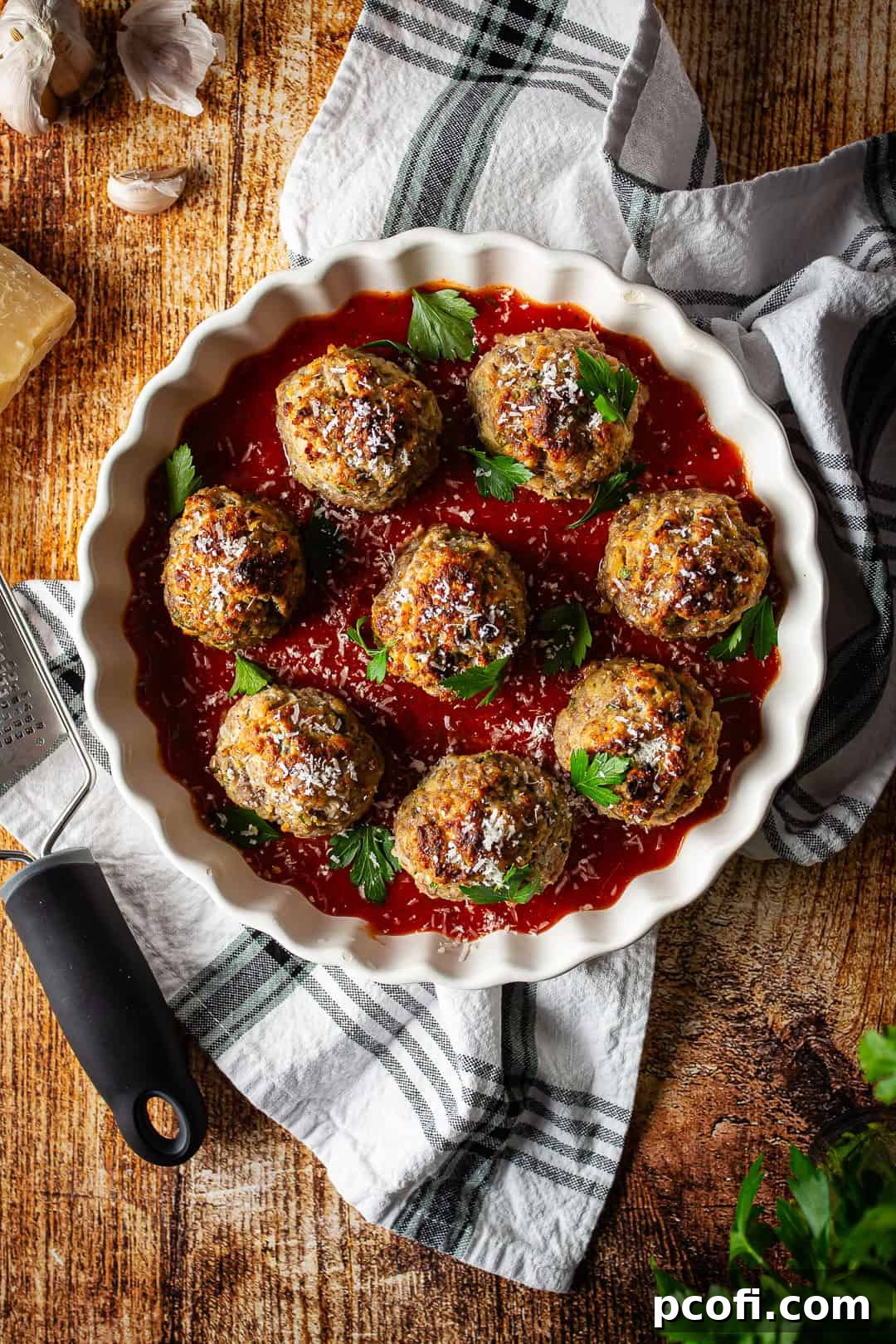 Perfectly cooked, tender meatballs resting in a baking dish, ready to be served or added to your favorite sauce.