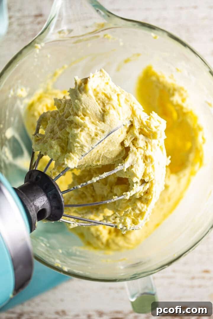 The finished German buttercream, smooth and fluffy in the mixing bowl.