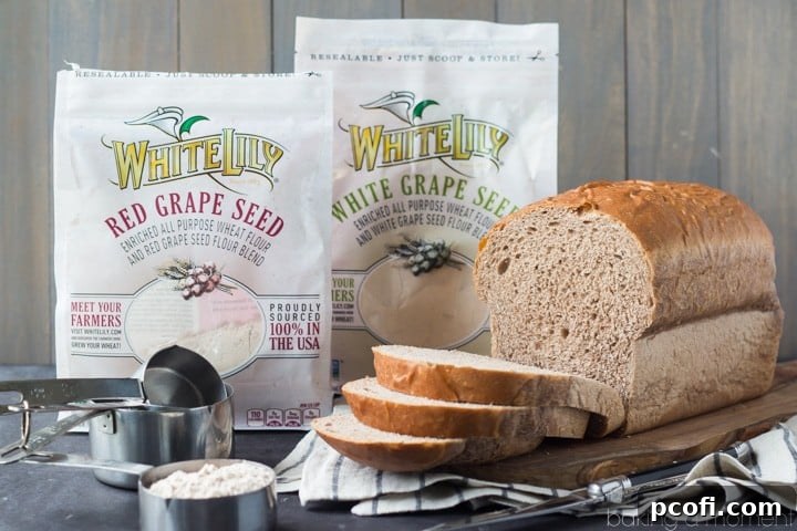 Our favorite Red Grapeseed Wheat Bread recipe with White Lily flour. Perfect for sandwiches and everyday enjoyment, a healthier alternative. #wholewheatbread #baking