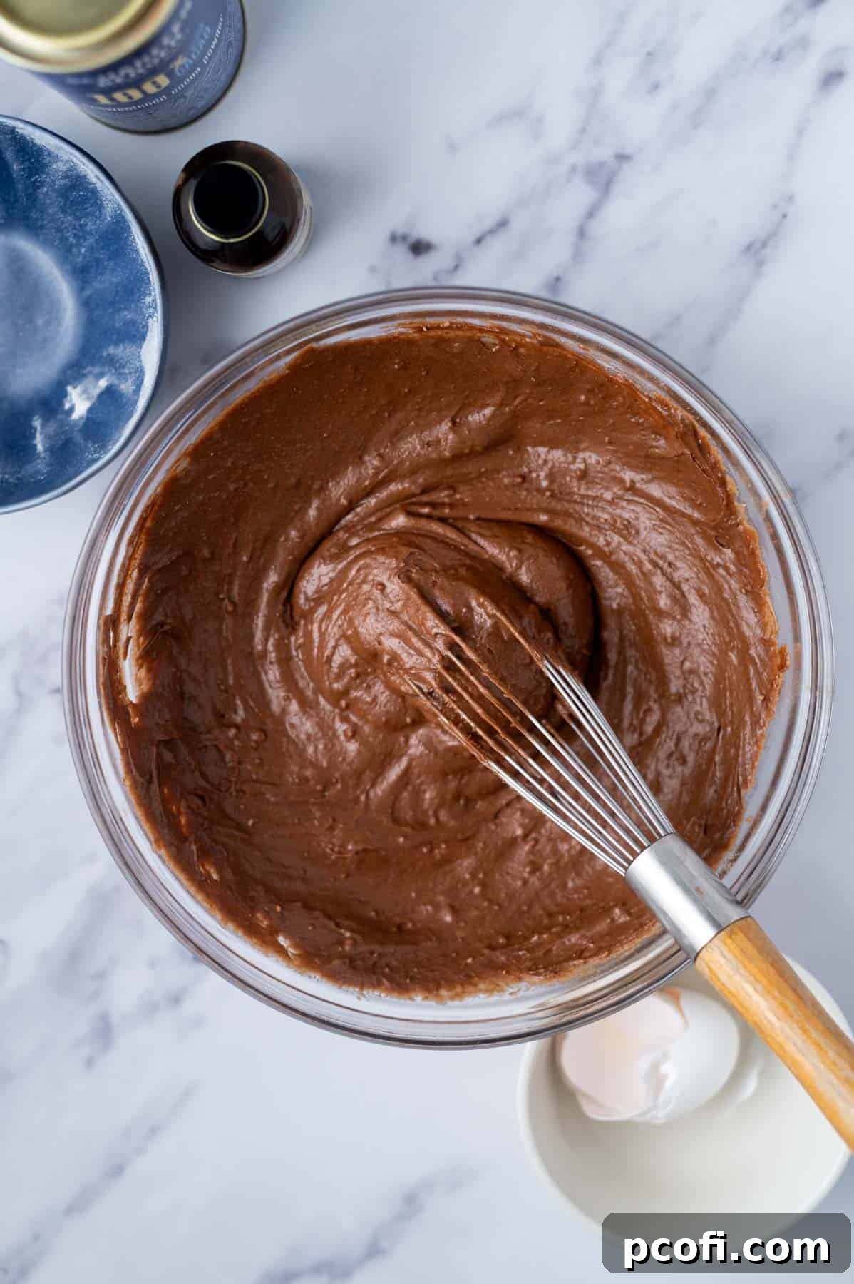 Step 4: The thick, rich brownie batter in a bowl, ready to be spread into the baking pan.