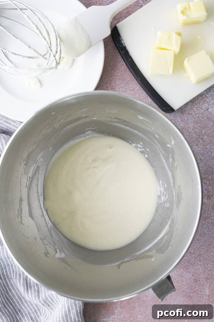 Adding butter to the cooled ingredients