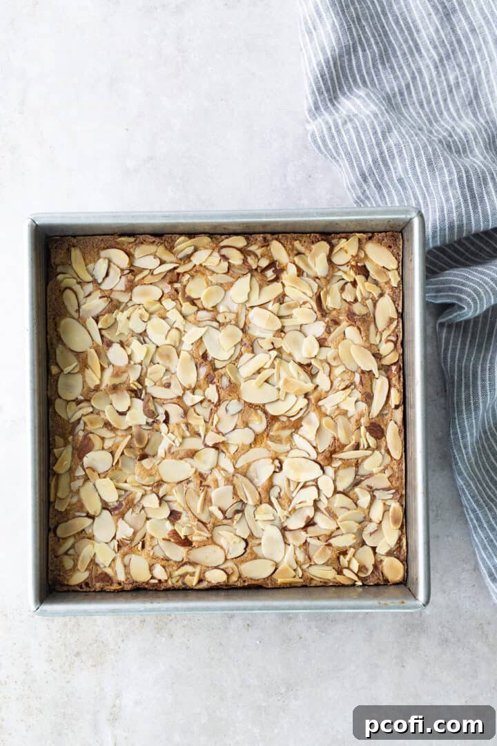Freshly baked almond blondies, golden brown, just out of the oven