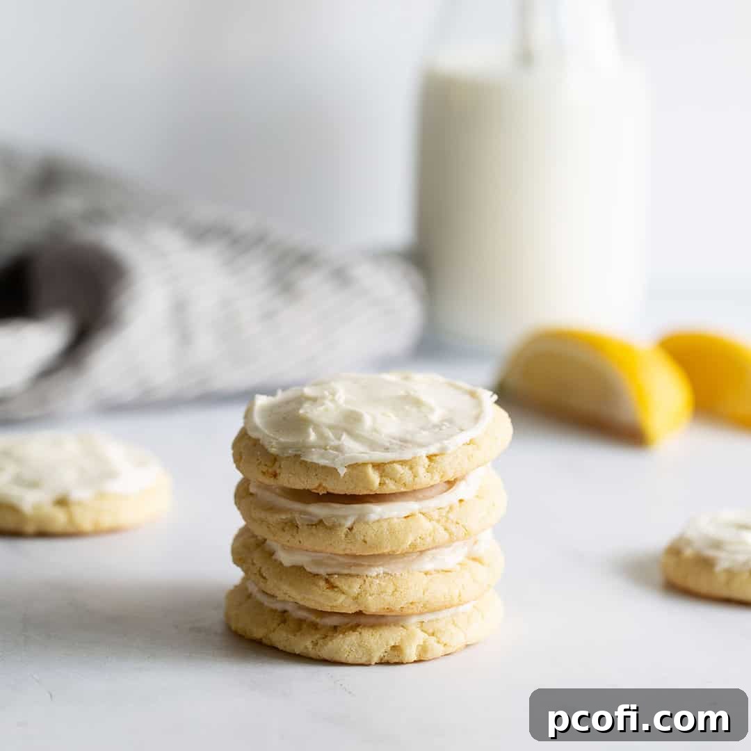 Lemon cookies stacked on top of each other.