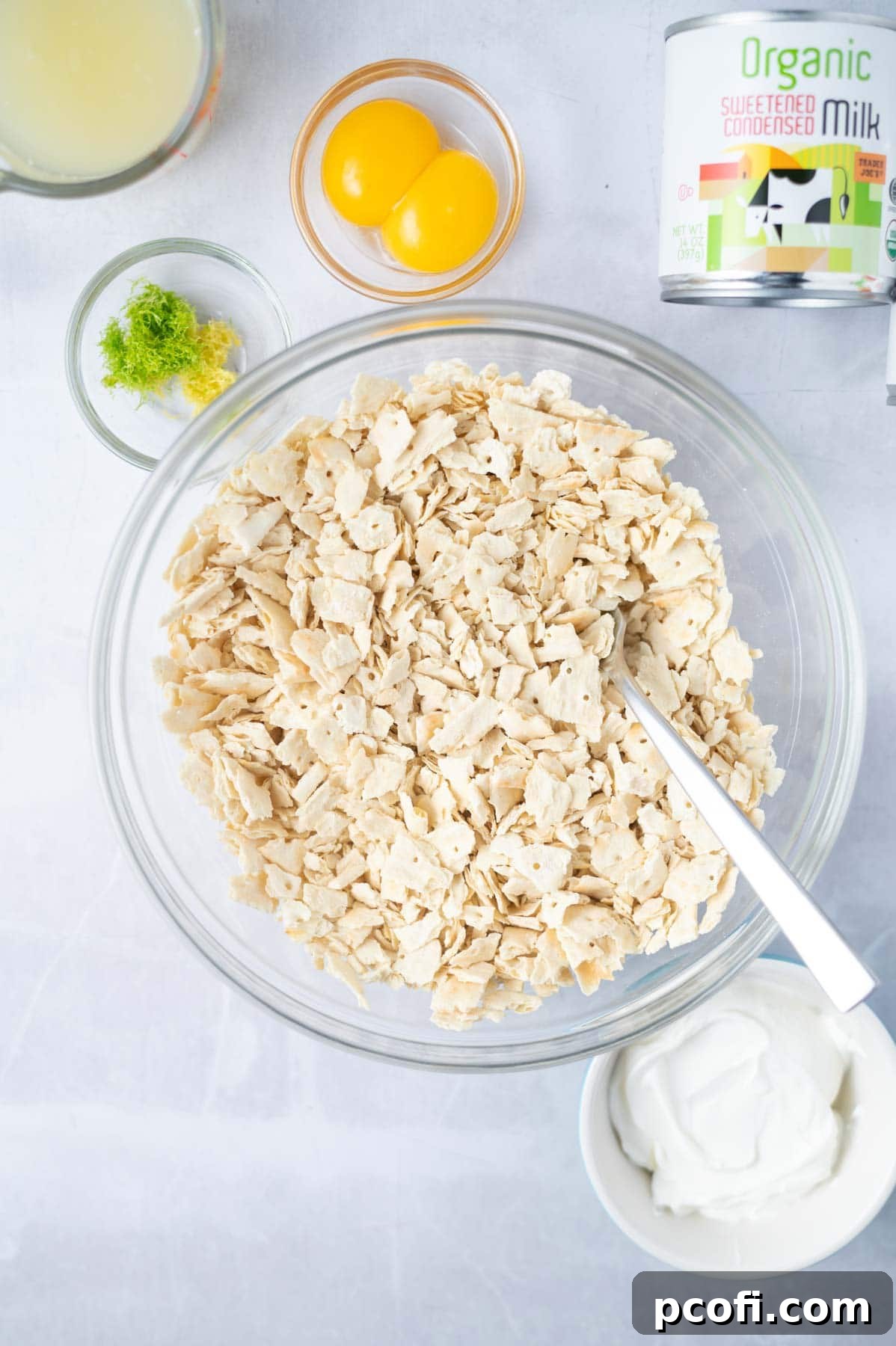 Crushed saltine crackers mixed with sugar and butter in a bowl, ready for the pie crust.