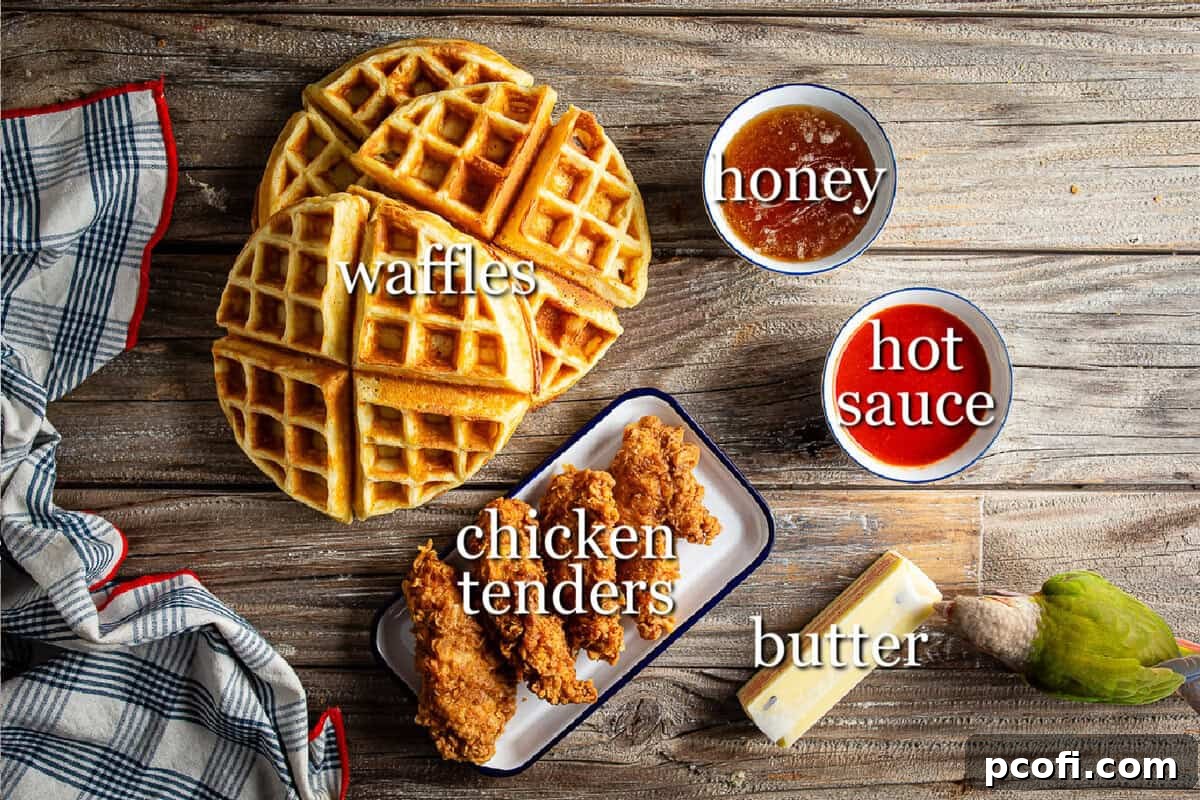 All the necessary ingredients for chicken and waffles are neatly arranged in separate containers, ready for preparation.