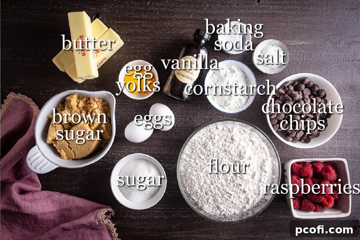 Ingredients for raspberry chocolate chip cookies in separate containers.