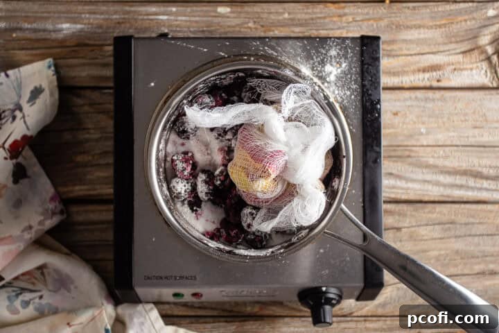 The satchel of apple core and peel and lemon peel and seeds added to the blackberry, sugar, and cornstarch mixture.