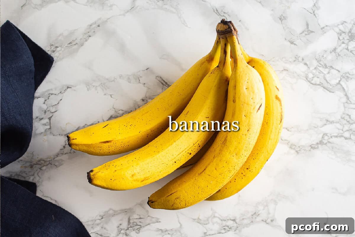 Ingredients from banana nice cream on a marble background.