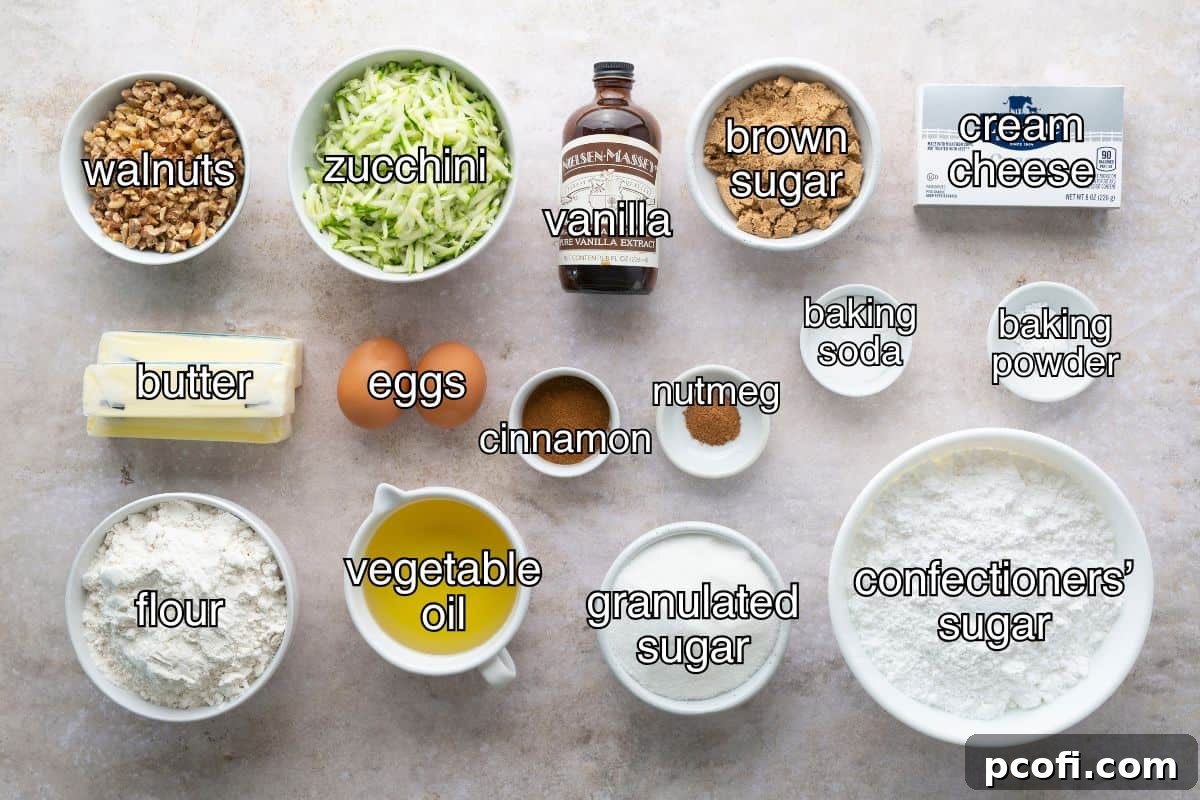 Various ingredients for zucchini cake laid out in separate bowls, including flour, sugar, eggs, and grated zucchini.