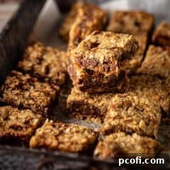 A delicious slice of Oatmeal Carmelitas, showcasing the layers.