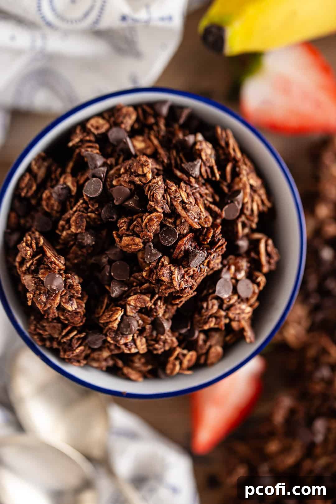 Chocolate granola in a bowl, showcasing its rich texture and clusters.
