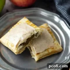 Pop tart broken in half revealing apple filling