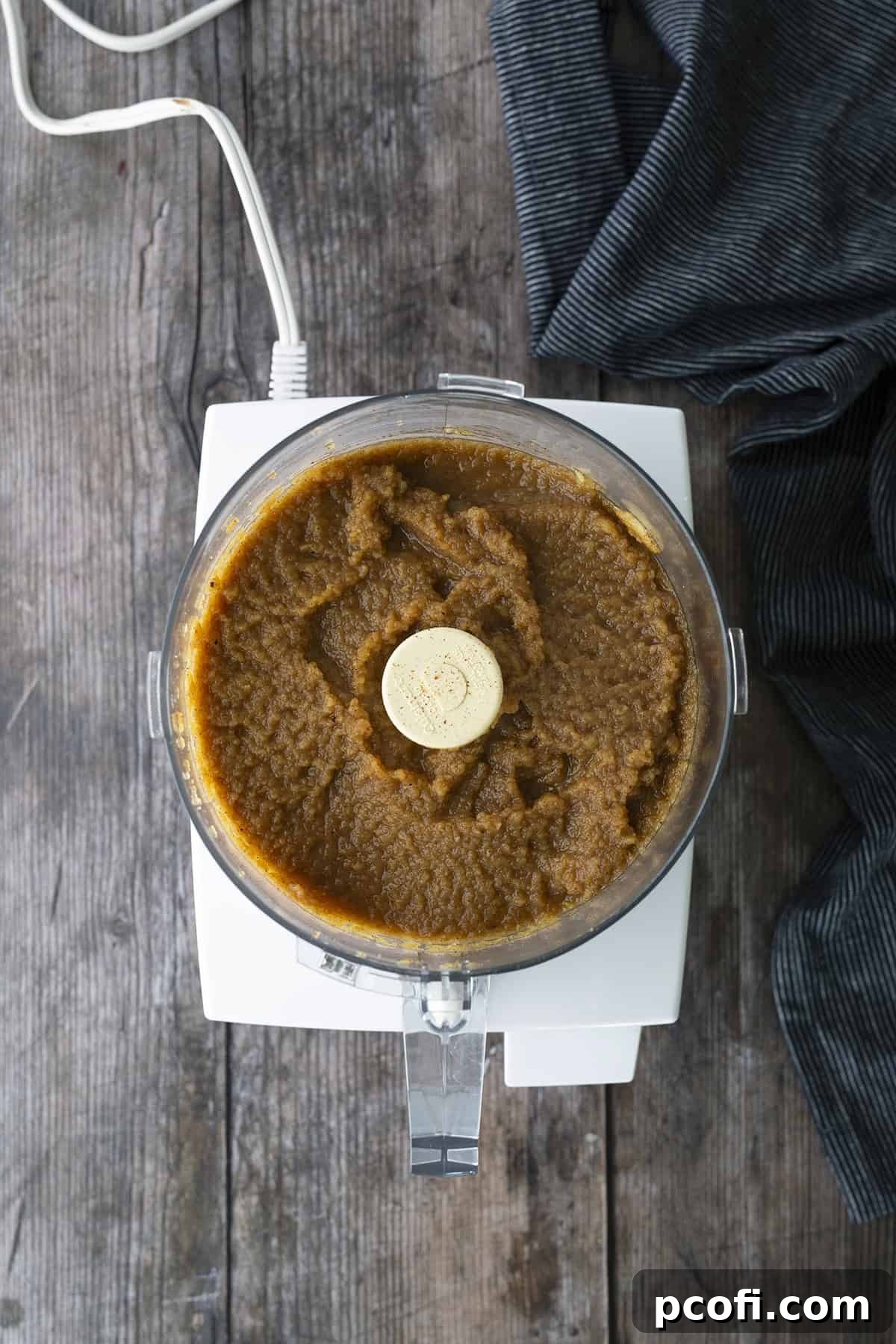 Pureed apples in a food processor